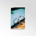 Pool with metal ladder on a white background