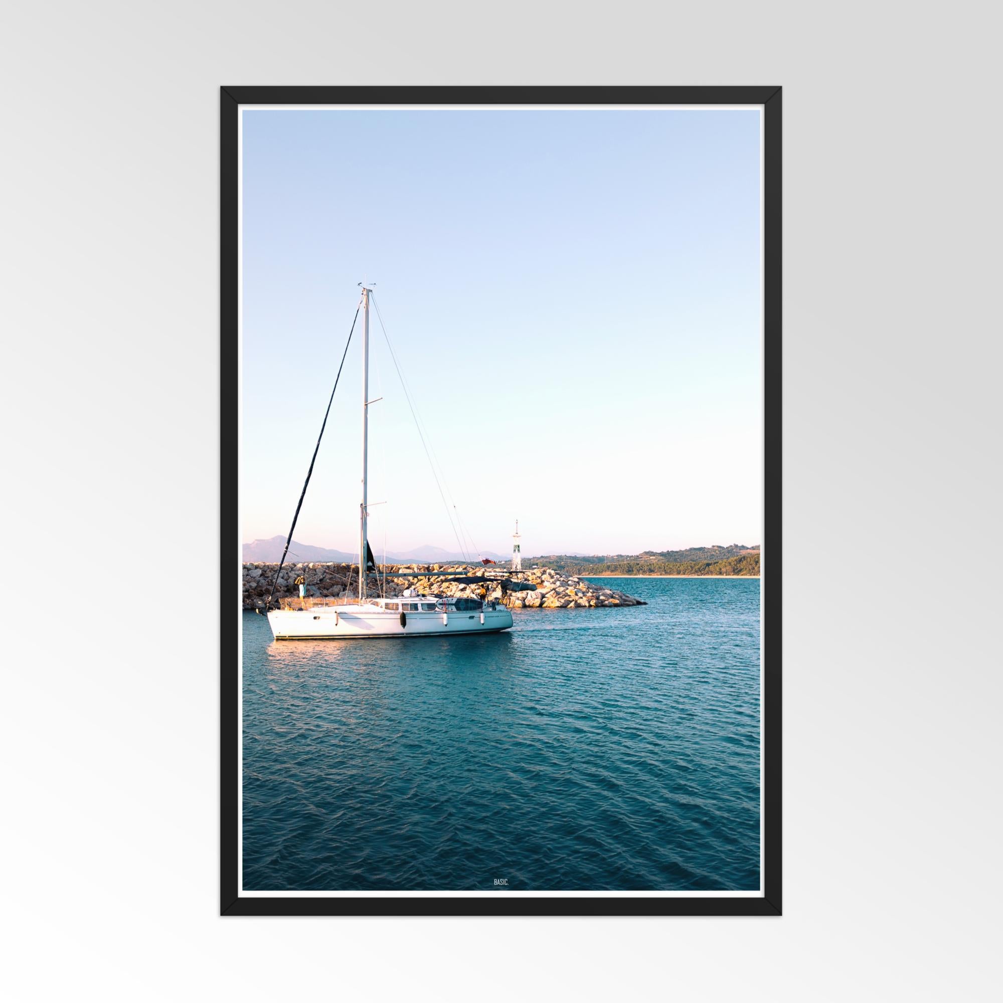 White yacht on calm blue water framec poster